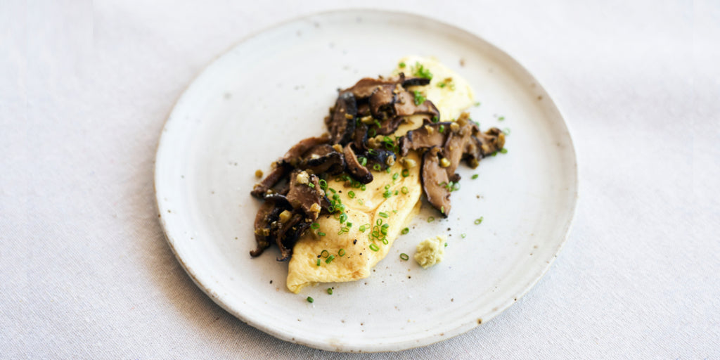 Breakfast omelette with shiitake and wasabi condiment